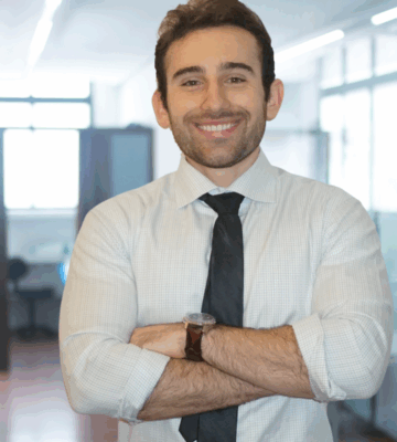 Professional headshot of Ibrahim Mulic, PA-C, CAQ-Psychiatry, wearing professional attire against a neutral background